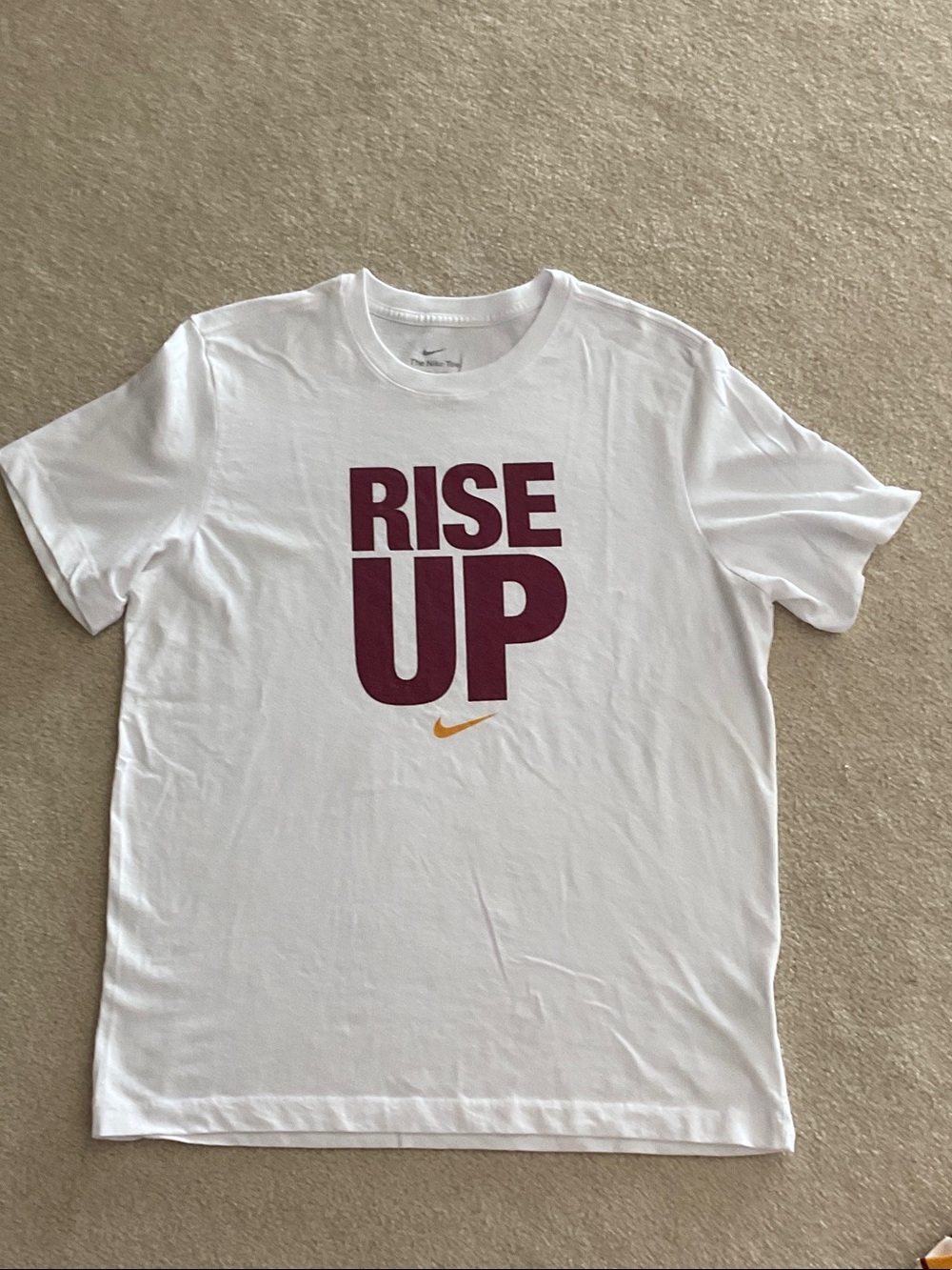 Nike White Tee with Maroon 'RISE UP' and Gold Swoosh